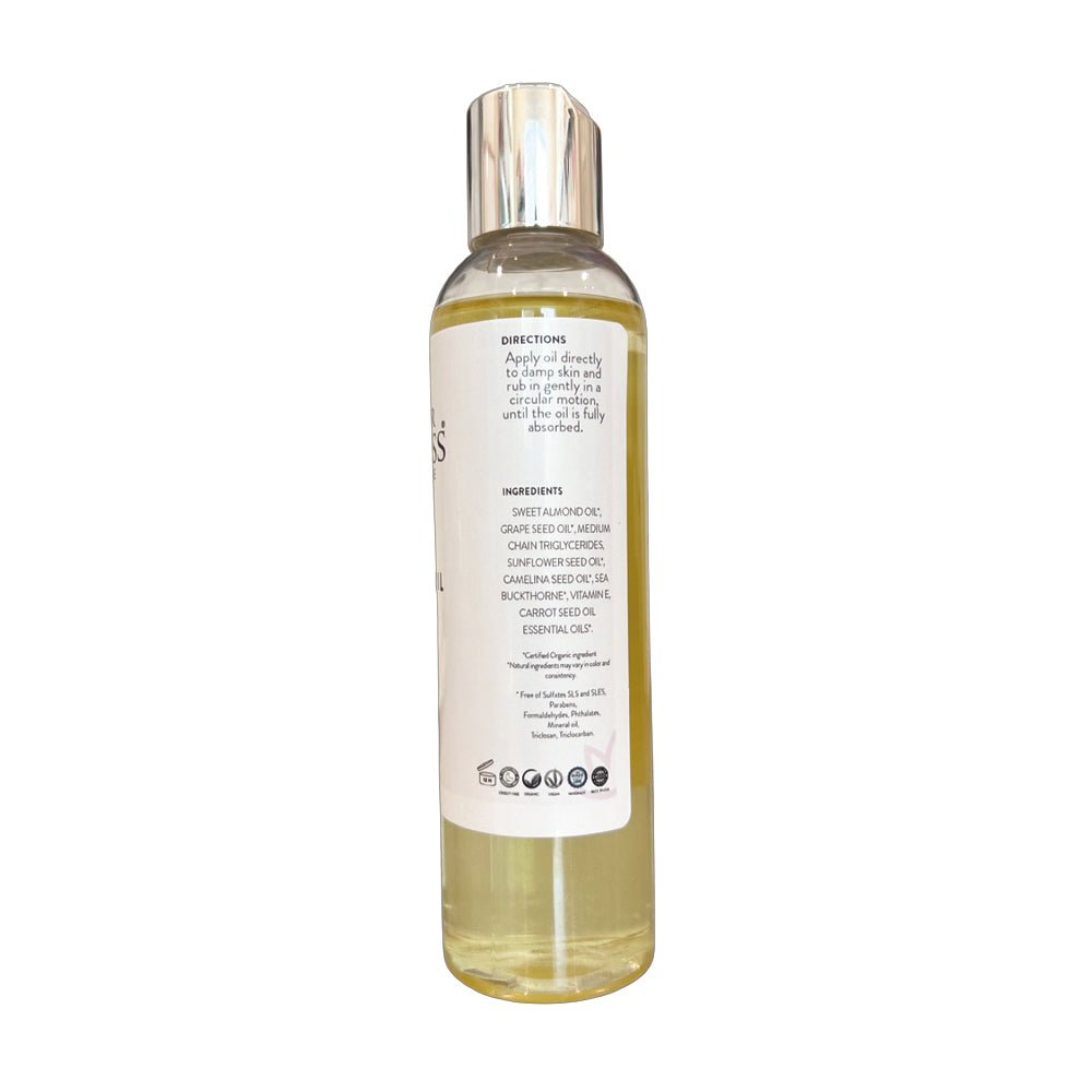 Detailed view of Glimmer Goddess Organic Sweet Almond Silky Skin Oil bottle, showcasing directions and ingredients to promote silky hydrated skin.