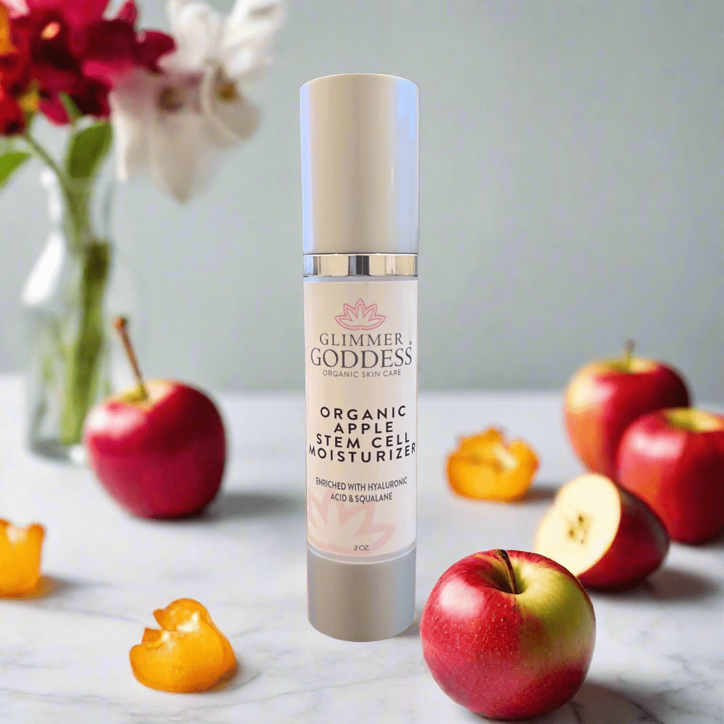 Glimmer Goddess Organic Apple Stem Cell Renewal Moisturizer featured with ripe apples, emphasizing a fresh and natural skincare experience by GNS Beauty & Personal Care.