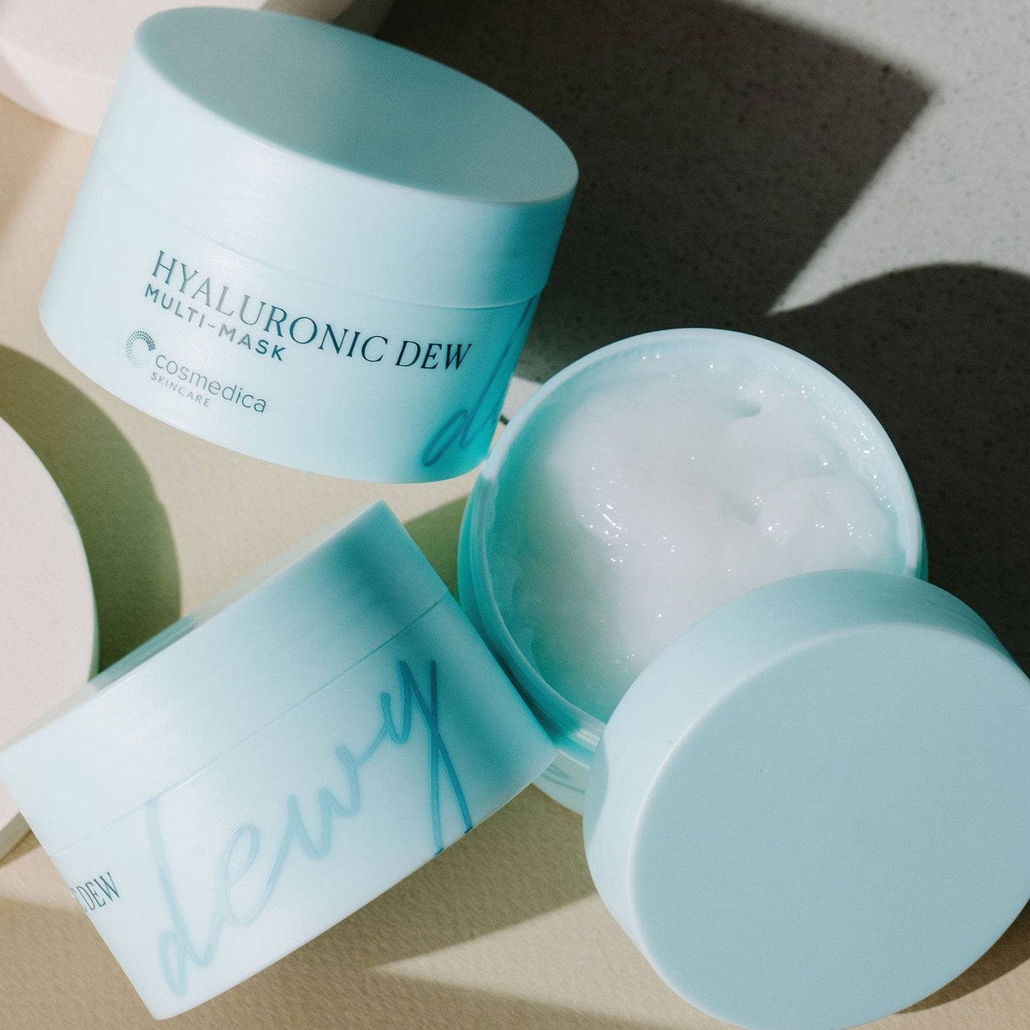 Open container of Hyaluronic Dew Multi-Mask from Cosmedica Skincare, displaying the rich, moisture-filled formula perfect for skin rejuvenation.