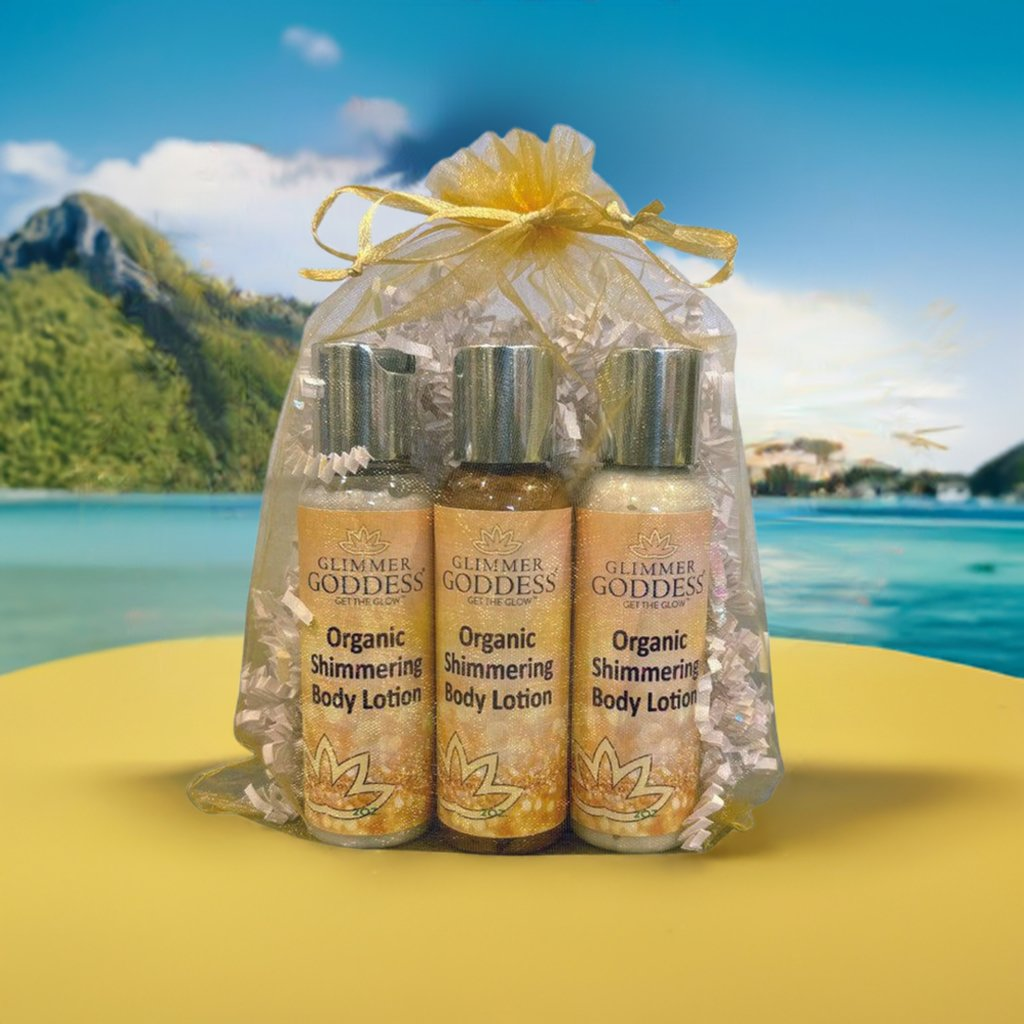 Organic Shimmer Body Lotion Travel Size Gift Set by GNS Beauty & Personal Care, featuring three shimmering body lotions in a decorative package, set against a scenic beach background.