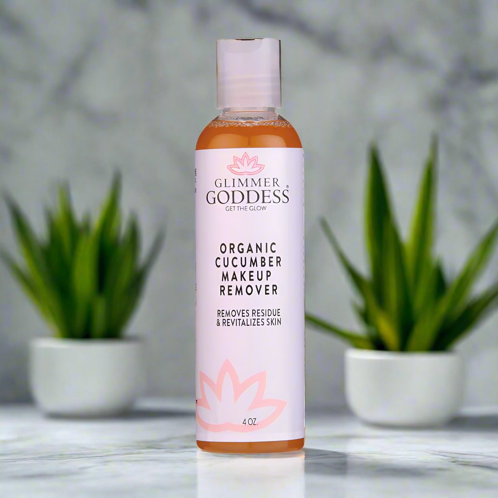 Elegant Glimmer Goddess Organic Cucumber Makeup Remover bottle with natural greenery, emphasizing revitalizing skin benefits, from GNS Beauty & Personal Care.