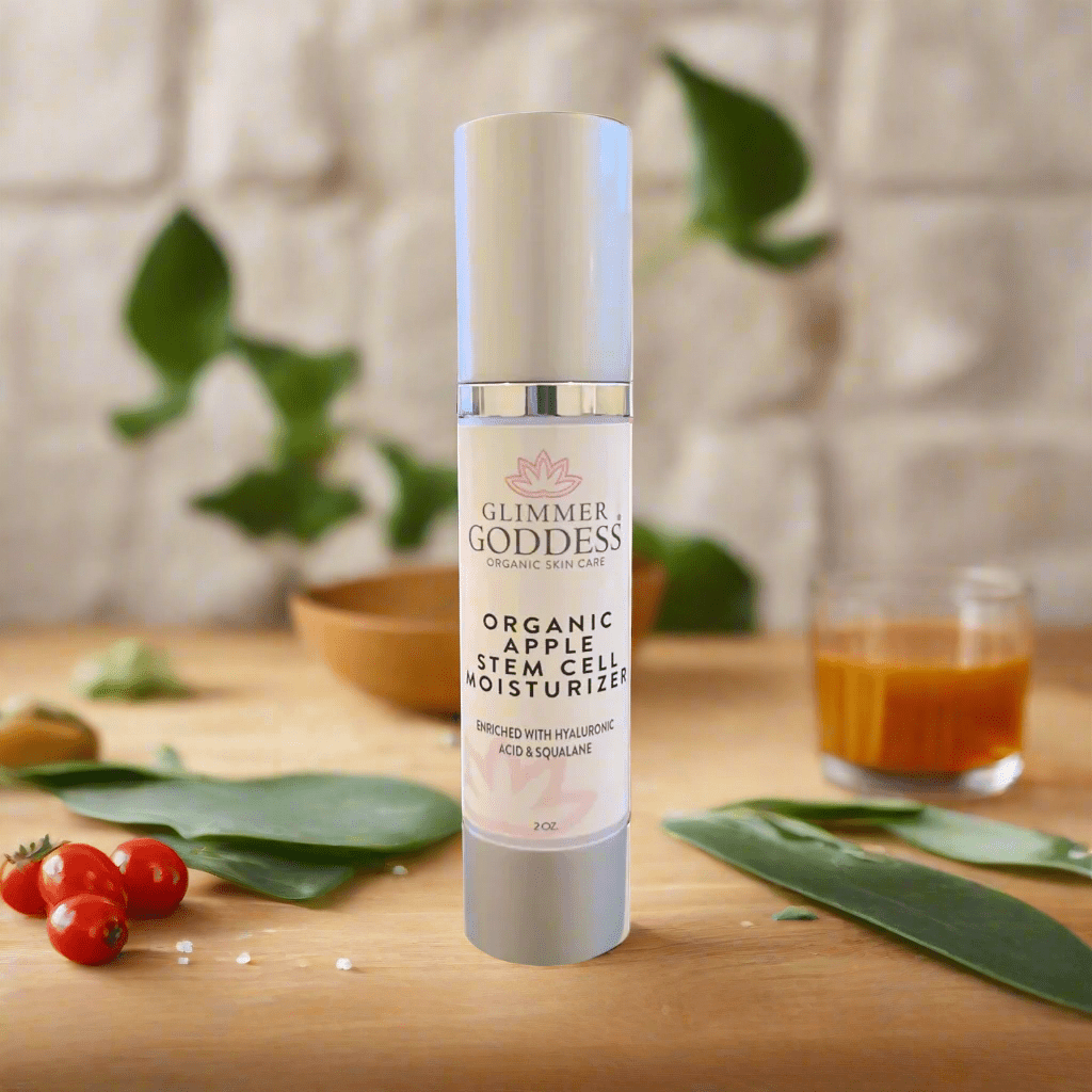 Glimmer Goddess Organic Apple Stem Cell Renewal Moisturizer in a cozy setting with natural elements, showcasing the product's natural ingredients by GNS Beauty & Personal Care.