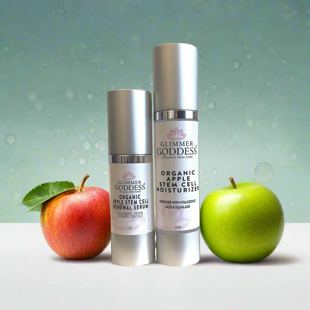 Glimmer Goddess Organic Apple Stem Cell Anti-Aging Duo displayed with fresh apples, includes moisturizing serum and cream for youthful skin, by GNS Beauty & Personal Care.