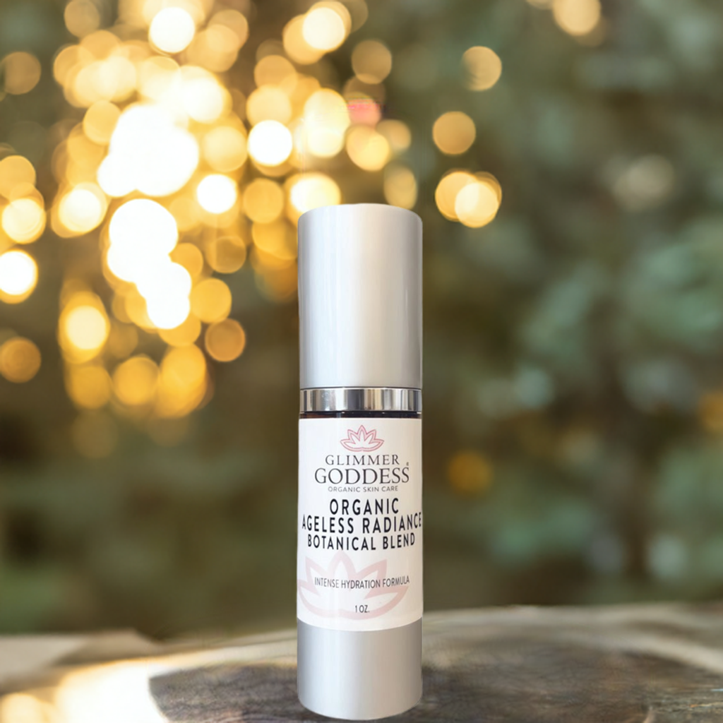 Glimmer Goddess Organic Skin Brightening Serum with a blurred background of golden lights, highlighting its intense hydration formula.