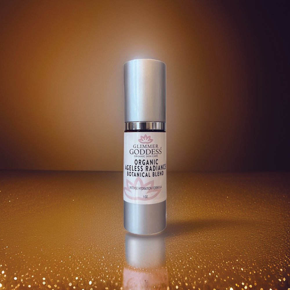 Glimmer Goddess Organic Skin Brightening Serum illuminated against a golden backdrop, capturing its luxurious essence and anti-aging benefits.