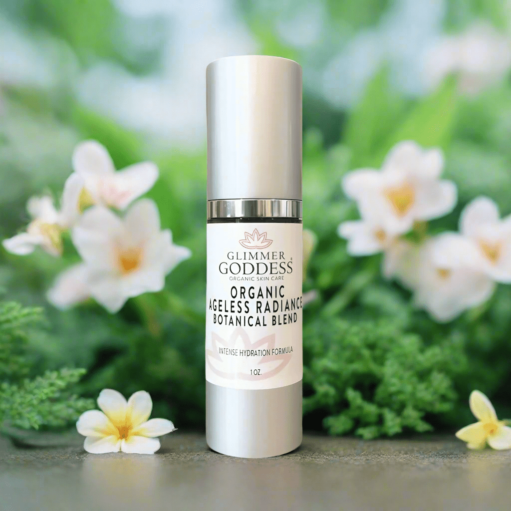 Glimmer Goddess Organic Skin Brightening Serum elegantly displayed among delicate white flowers, emphasizing its natural ingredients and hydrating qualities for a radiant complexion.