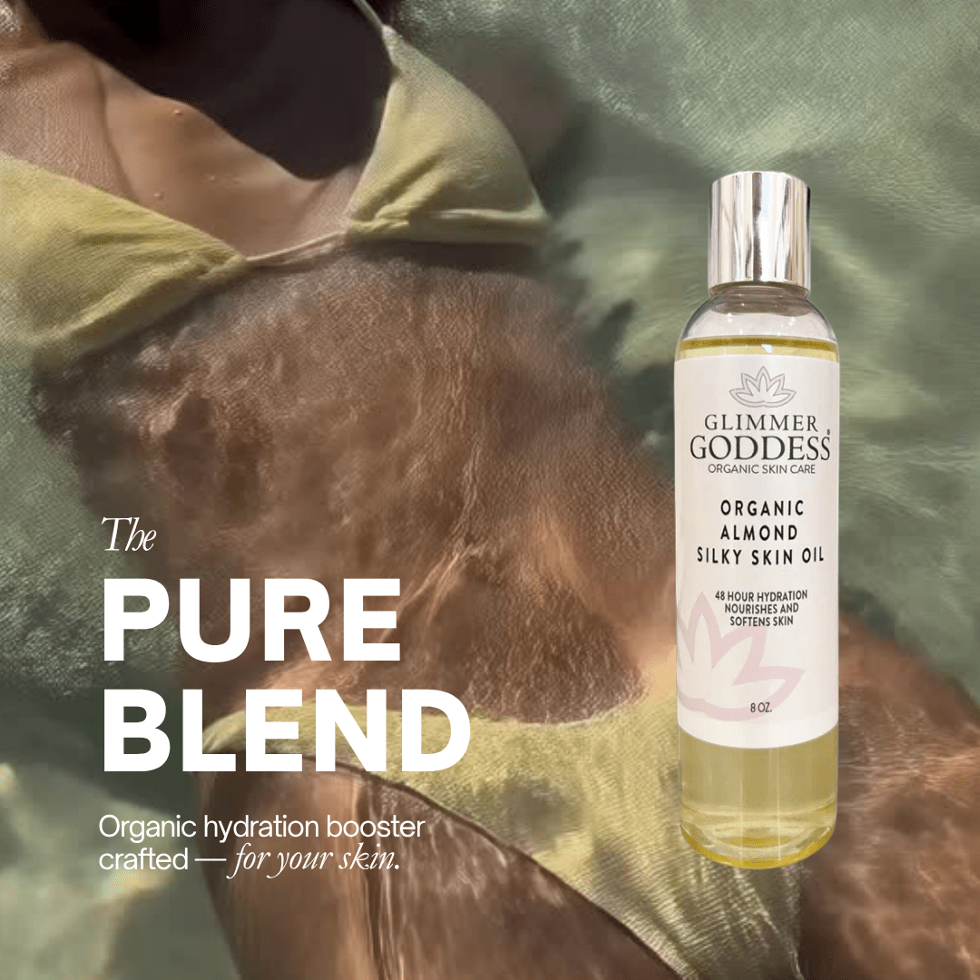 Glimmer Goddess Organic Sweet Almond Silky Skin Oil displayed in a serene setting with a model in a swimsuit, emphasizing the product's hydrating and skin-softening properties.