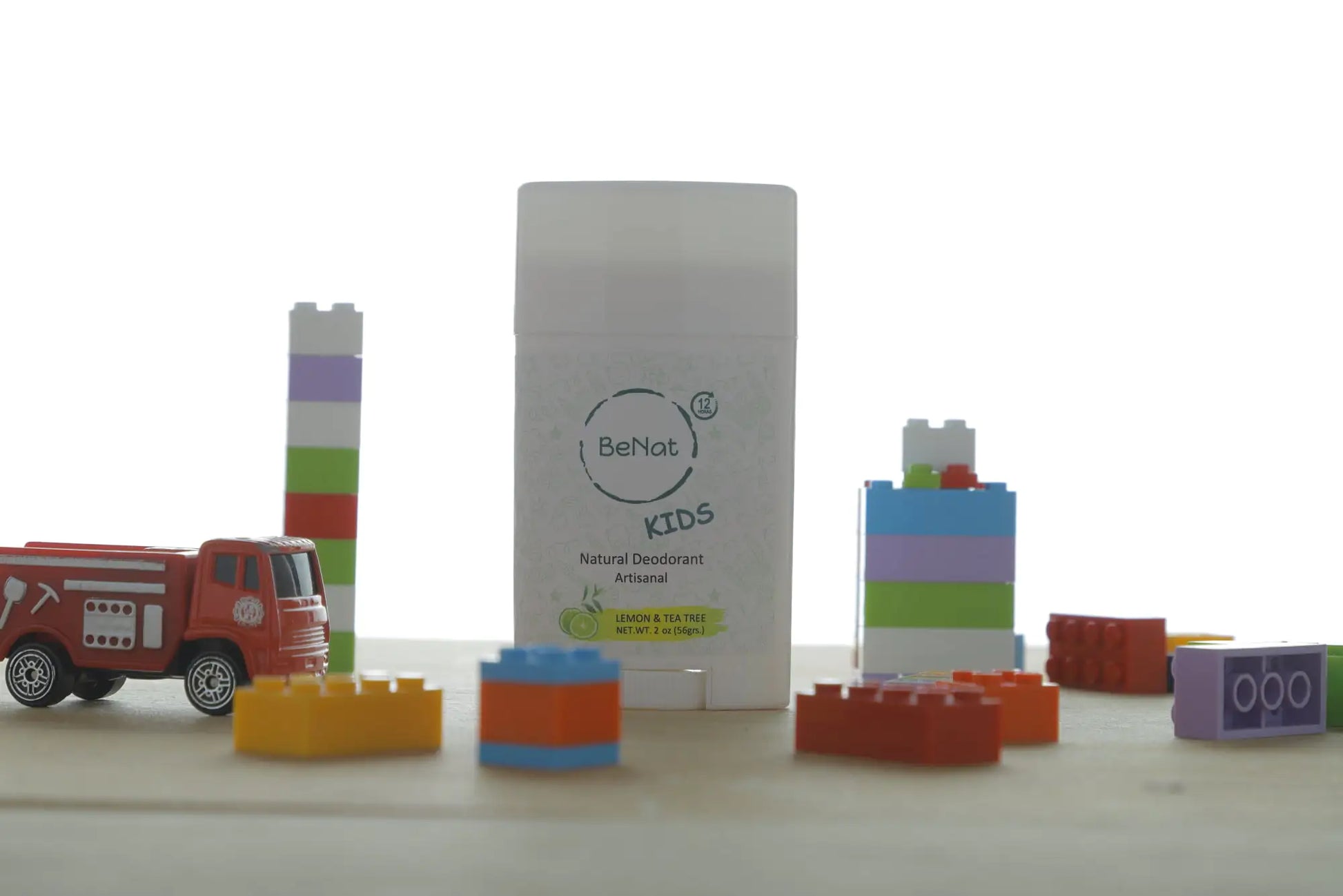 BeNat All-Natural Deodorant for Kids displayed among colorful building blocks and a toy truck, symbolizing its playful and kid-friendly nature.
