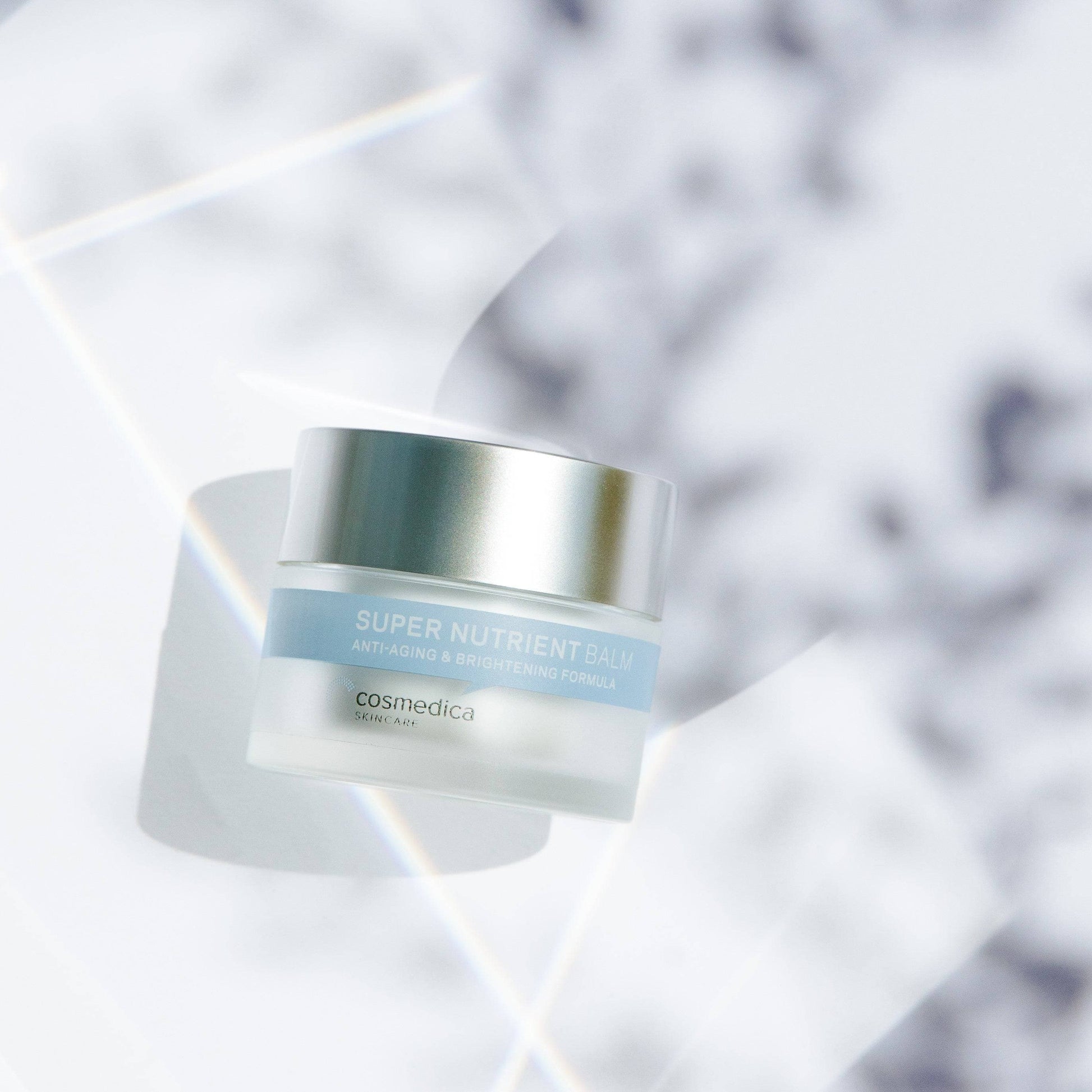 Close-up of Cosmedica Skincare Super Nutrient Facial Balm showcasing its rich texture and nourishing ingredients