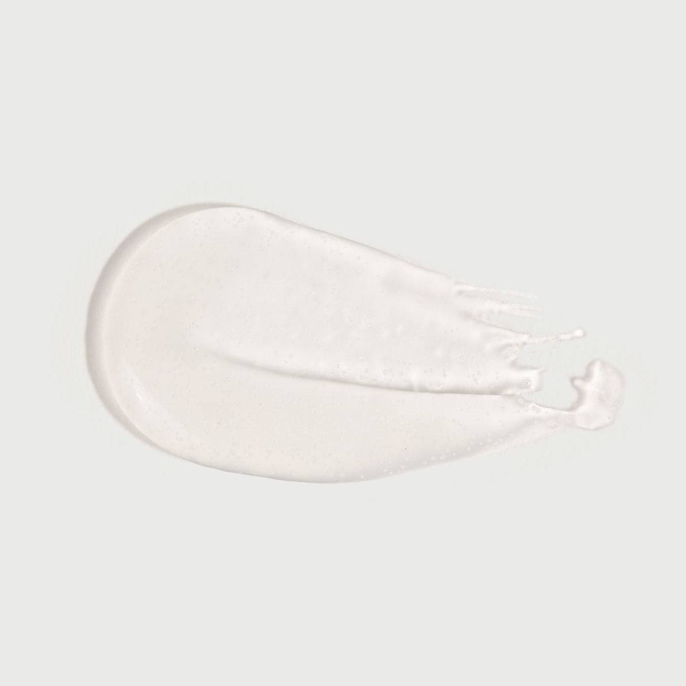 A smooth, white gel texture representing Cosmedica Skincare's Brightening Eye Treatment Gel, ideal for hydrating and brightening the eye area.