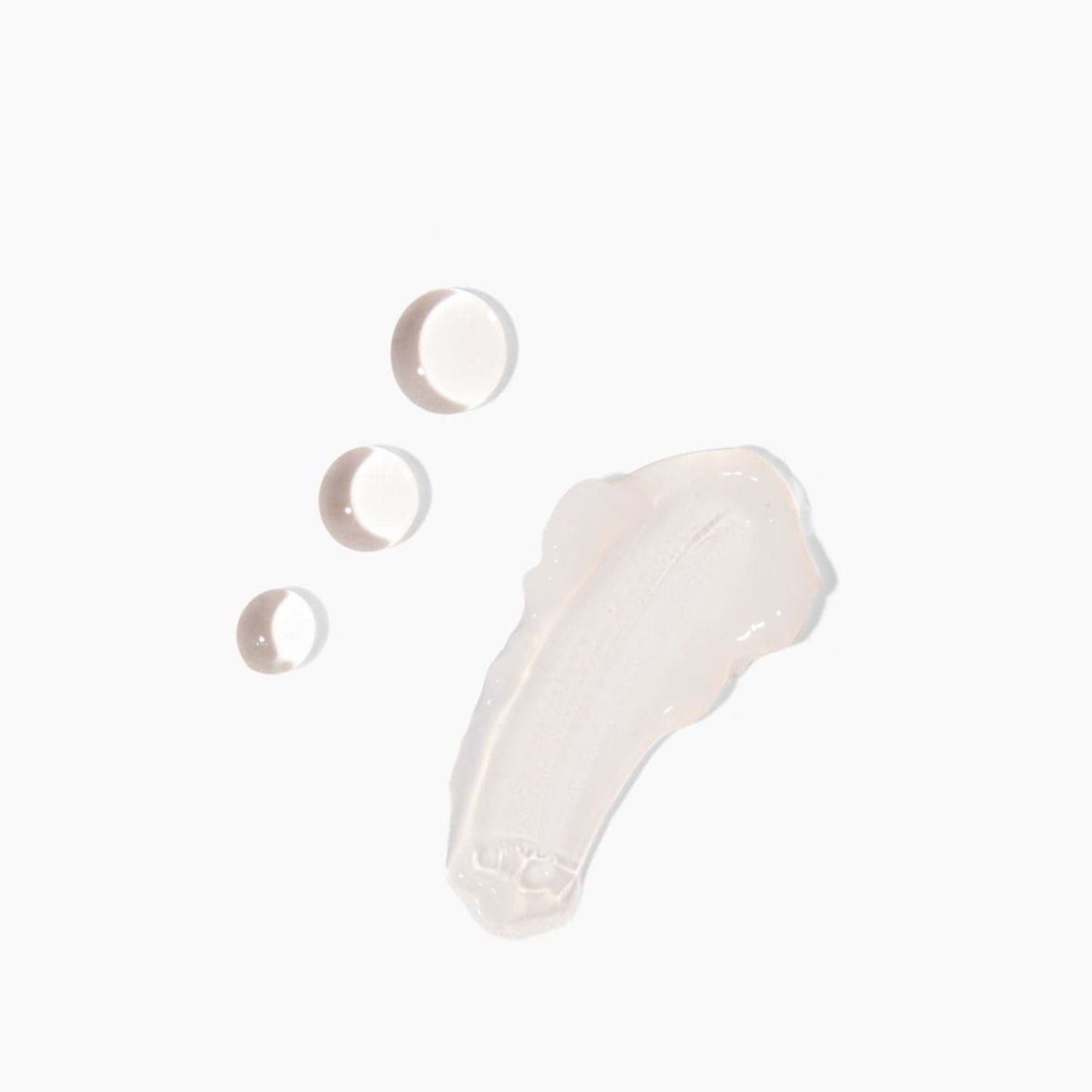 Close-up of the Hyaluronic Dew Multi-Mask by Cosmedica Skincare showing gel-like texture with three droplets on a white background, perfect for hydration.