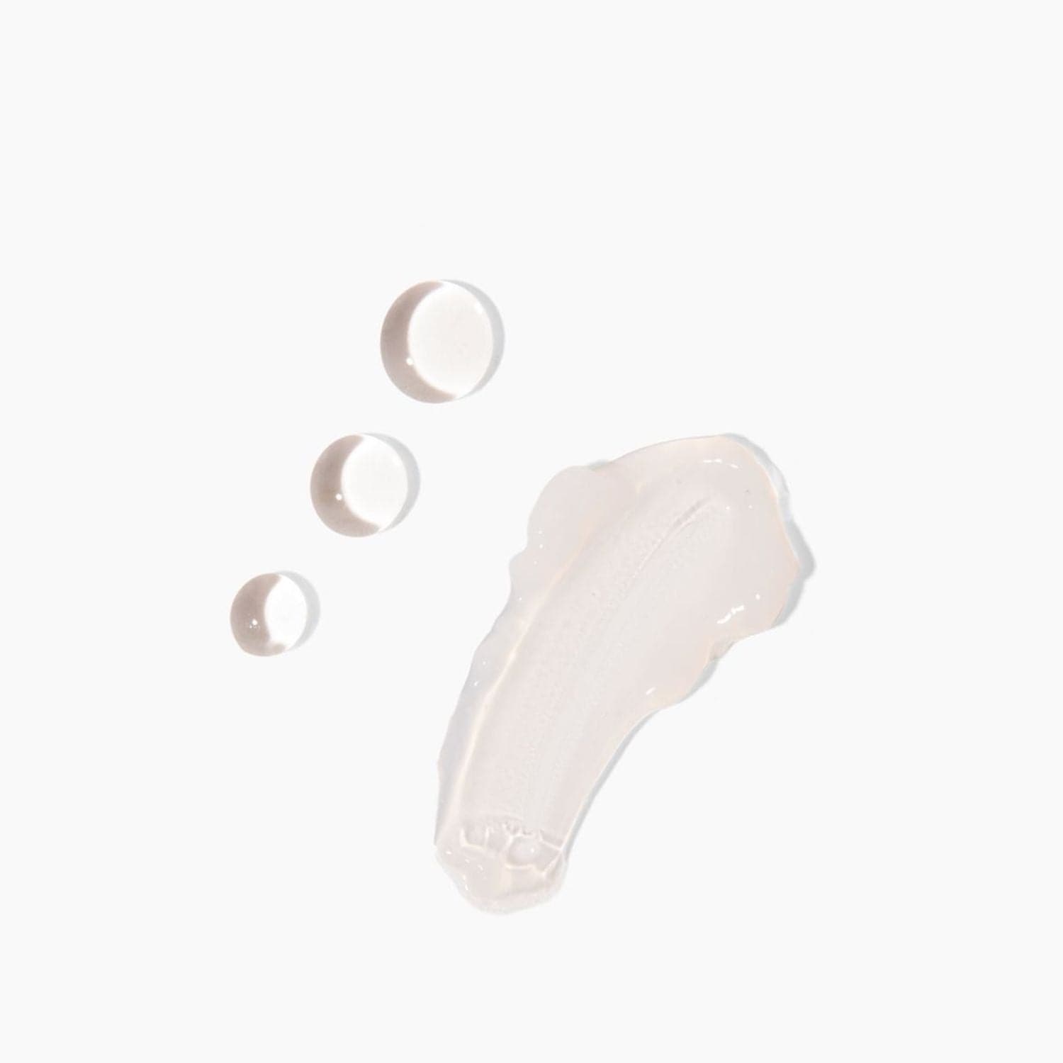 Close-up of the Hyaluronic Dew Multi-Mask by Cosmedica Skincare showing gel-like texture with three droplets on a white background, perfect for hydration.