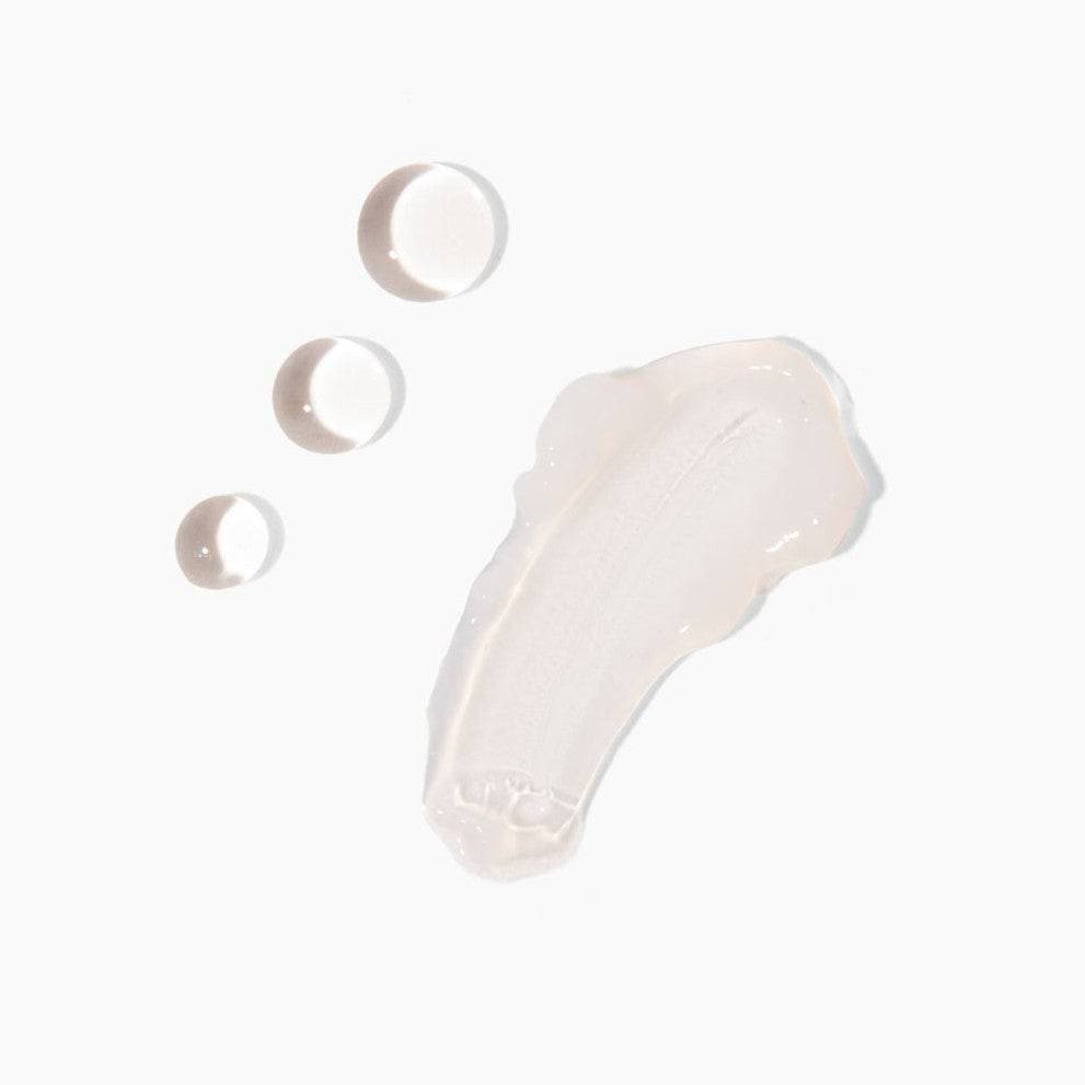 Close-up of a hydrating gel texture alongside droplets, part of the Hydrating Duo by Cosmedica Skincare, showcasing nourishing ingredients and smooth application.