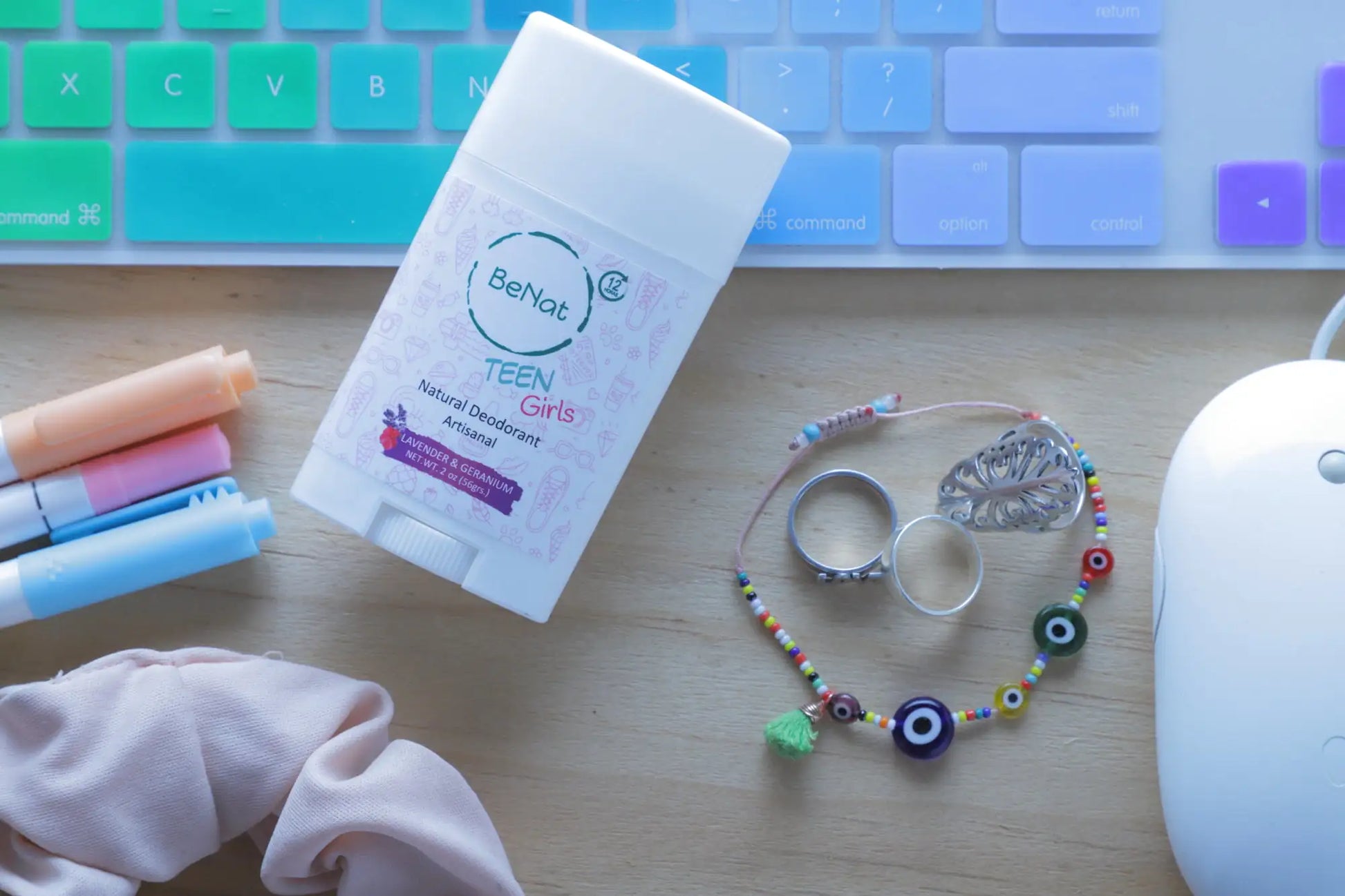 BeNat All-Natural Deodorant Stick for Kids & Teens displayed on a desk with colorful stationery and accessories, showcasing its gentle formula for young users.