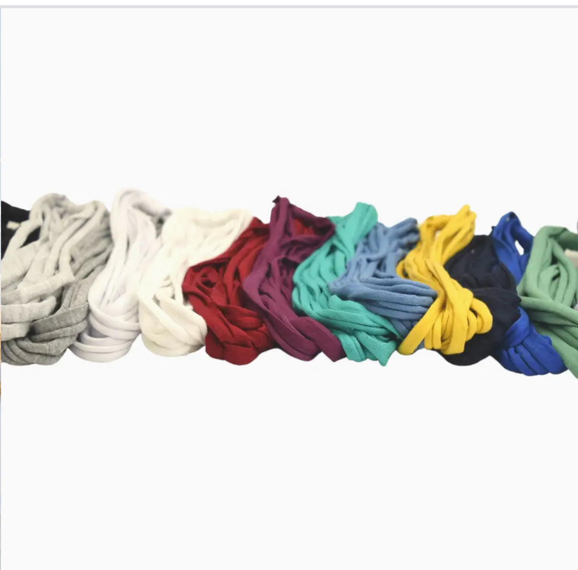 Assorted Bela Band Headbands in different colors laid out, emphasizing the sustainable fashion options from Bela Band.
