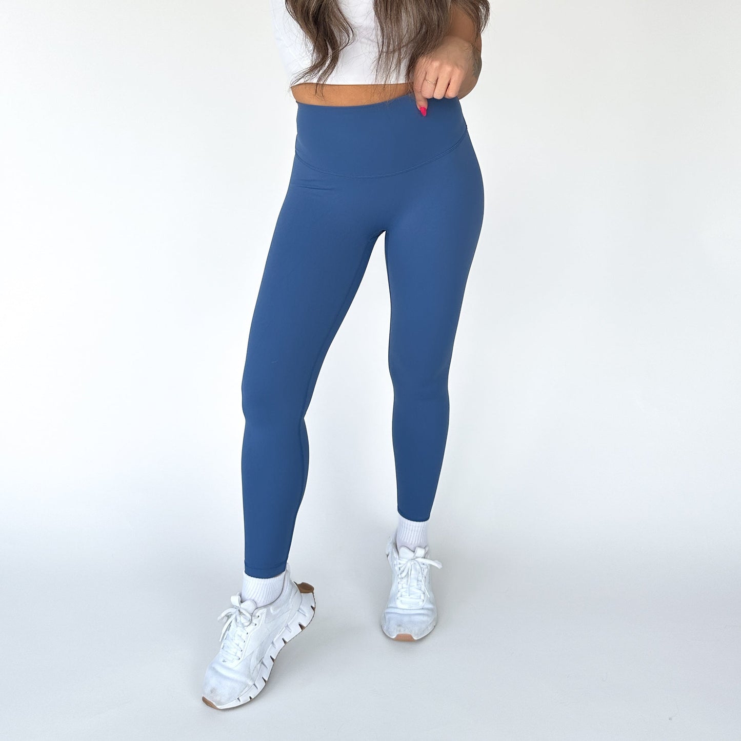 Front view of blue Buttery Soft Seamless Leggings by DYM Athletics, ideal for support and style in your fitness routine.