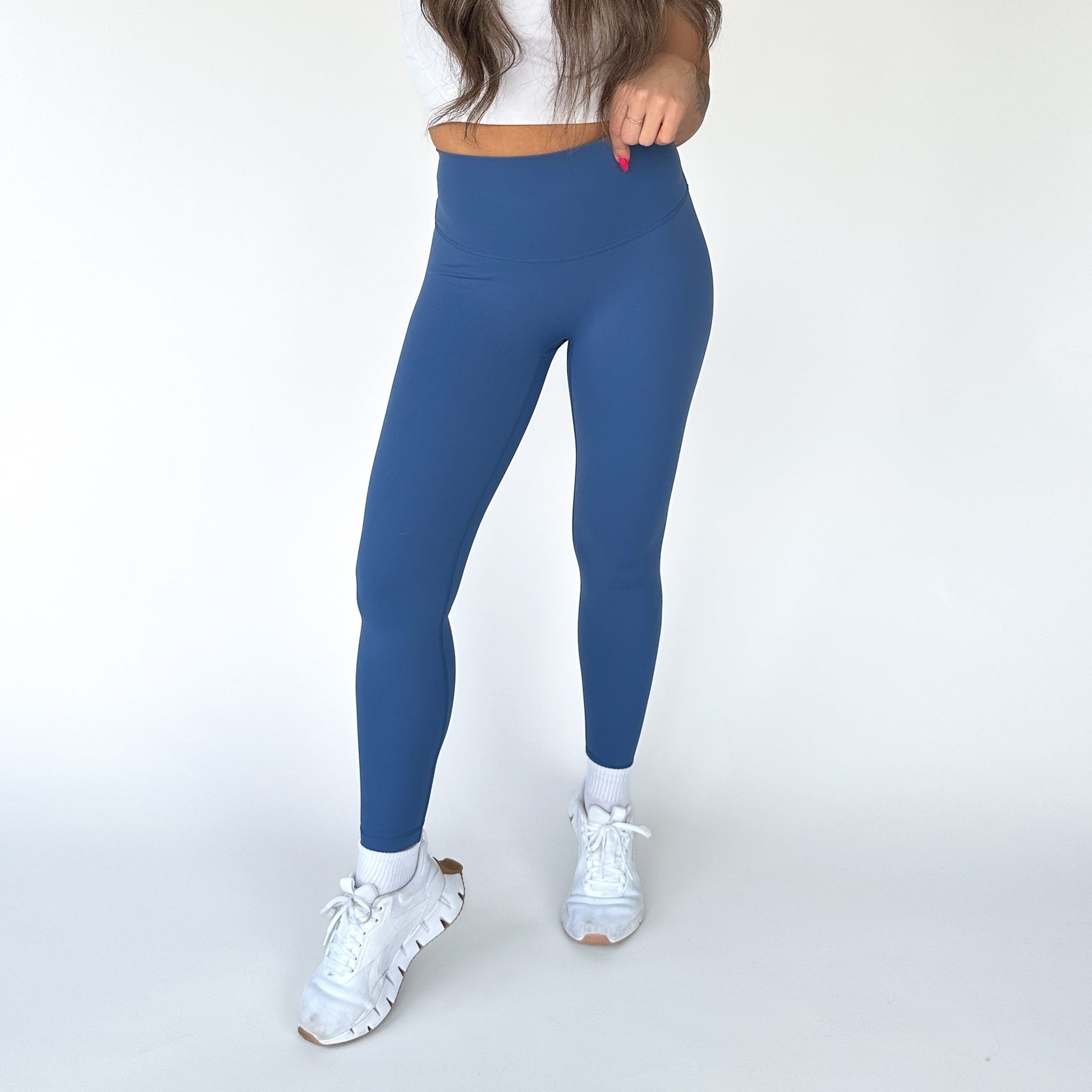Front view of blue Buttery Soft Seamless Leggings by DYM Athletics, ideal for support and style in your fitness routine.