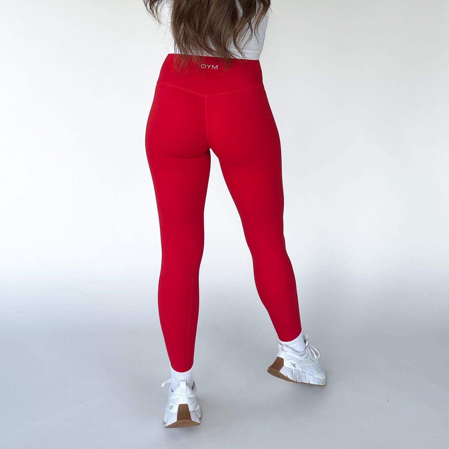 DYM Athletics Buttery Soft Seamless Leggings in red, featuring a back view to accentuate the fit and design for activewear.