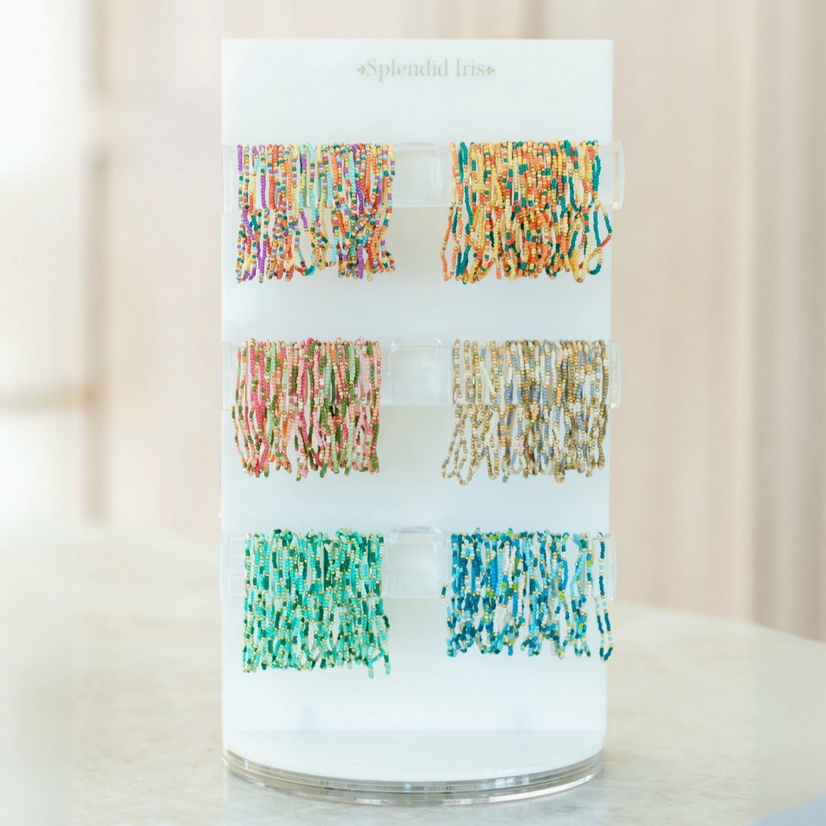 Colorful display of handcrafted stretch seed bead bracelet sets by Splendid Iris showcasing vibrant colors and unique designs.