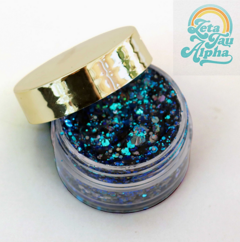 Go Greek Face Glitter Set by Stinaface containing a beautiful blend of blue and silver glitters in a trendy jar, perfect for glam occasions.