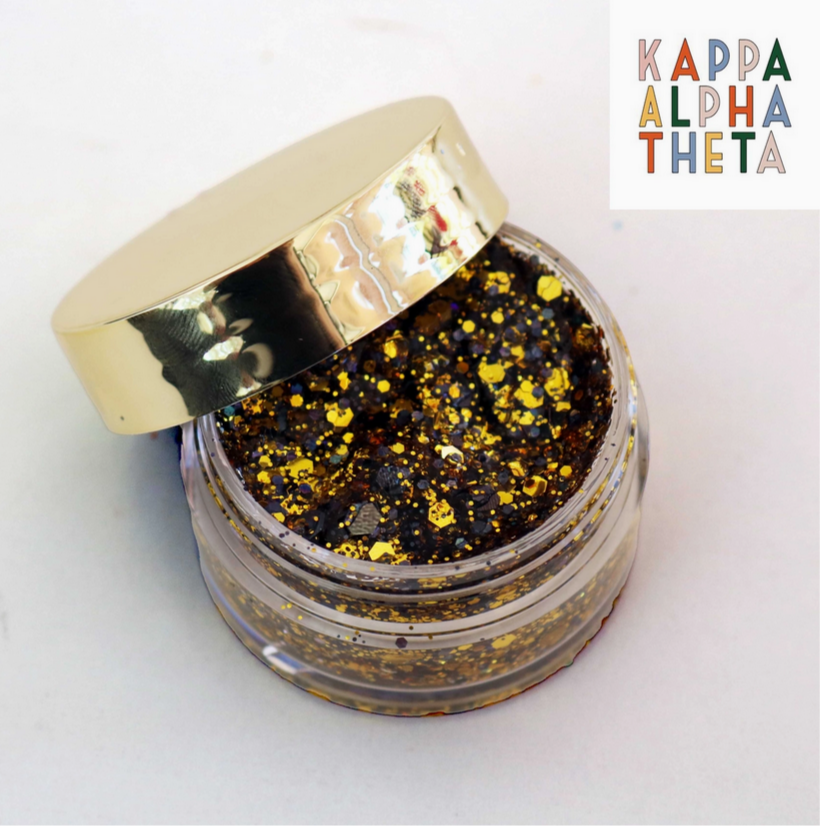 Go Greek Face Glitter Set by Stinaface featuring a rich blend of black, gold, and glittery flakes in a fashionable jar, ideal for any celebration.