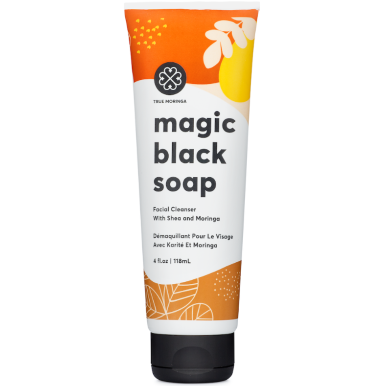 Magic Black Soap Facial Cleanser by True Moringa in a vibrant tube with orange and yellow accents, perfect for achieving radiant skin.