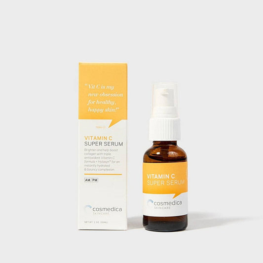 Cosmedica Skincare Vitamin C Super Serum in a small amber bottle with a box, showcasing the product's brightening properties and packaging.