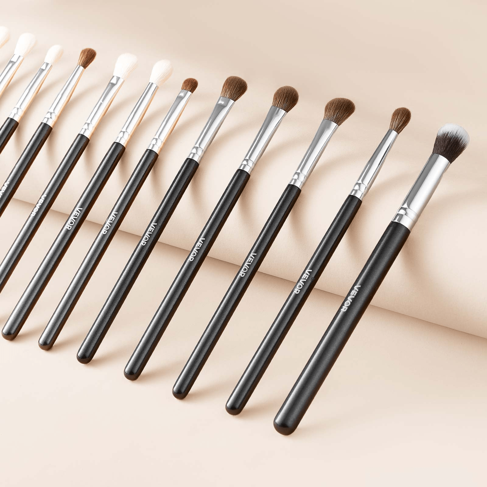 Close-up view of various VEVOR makeup brushes, highlighting their soft bristles and glossy wooden handles, ideal for precision application, presenting the VEVOR 34-Piece Makeup Brush Set by GNS Beauty & Personal Care.